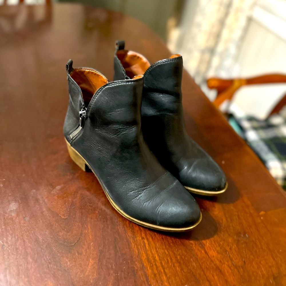 Sassy low black boots.